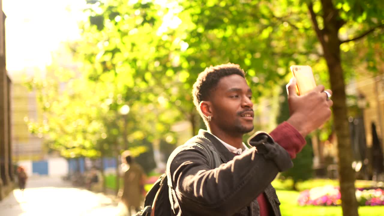 Man taking a selfie outdoors