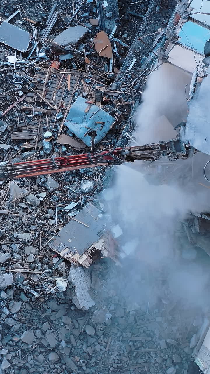 Demolution Destruction an Old House Building. Destroying Old House With Bulldozer Mechanical Arm