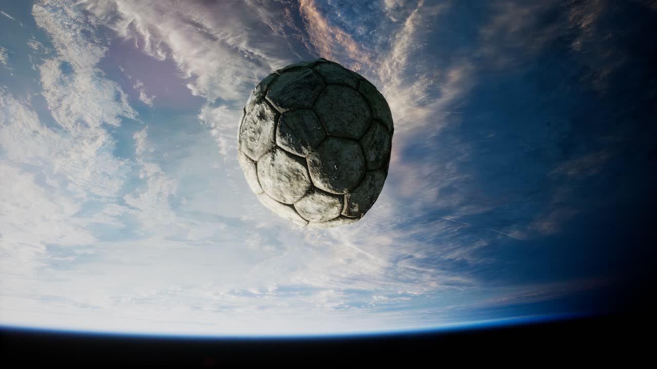 vieja pelota de fútbol en el espacio en órbita terrestre