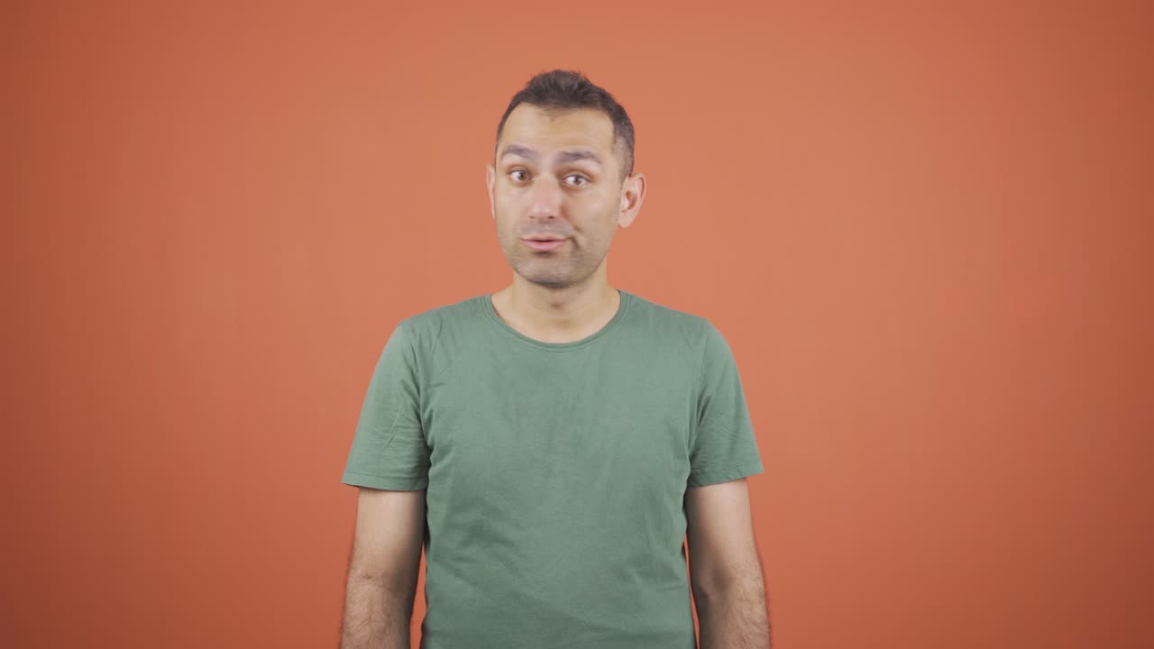 Businessman saying no to the camera.