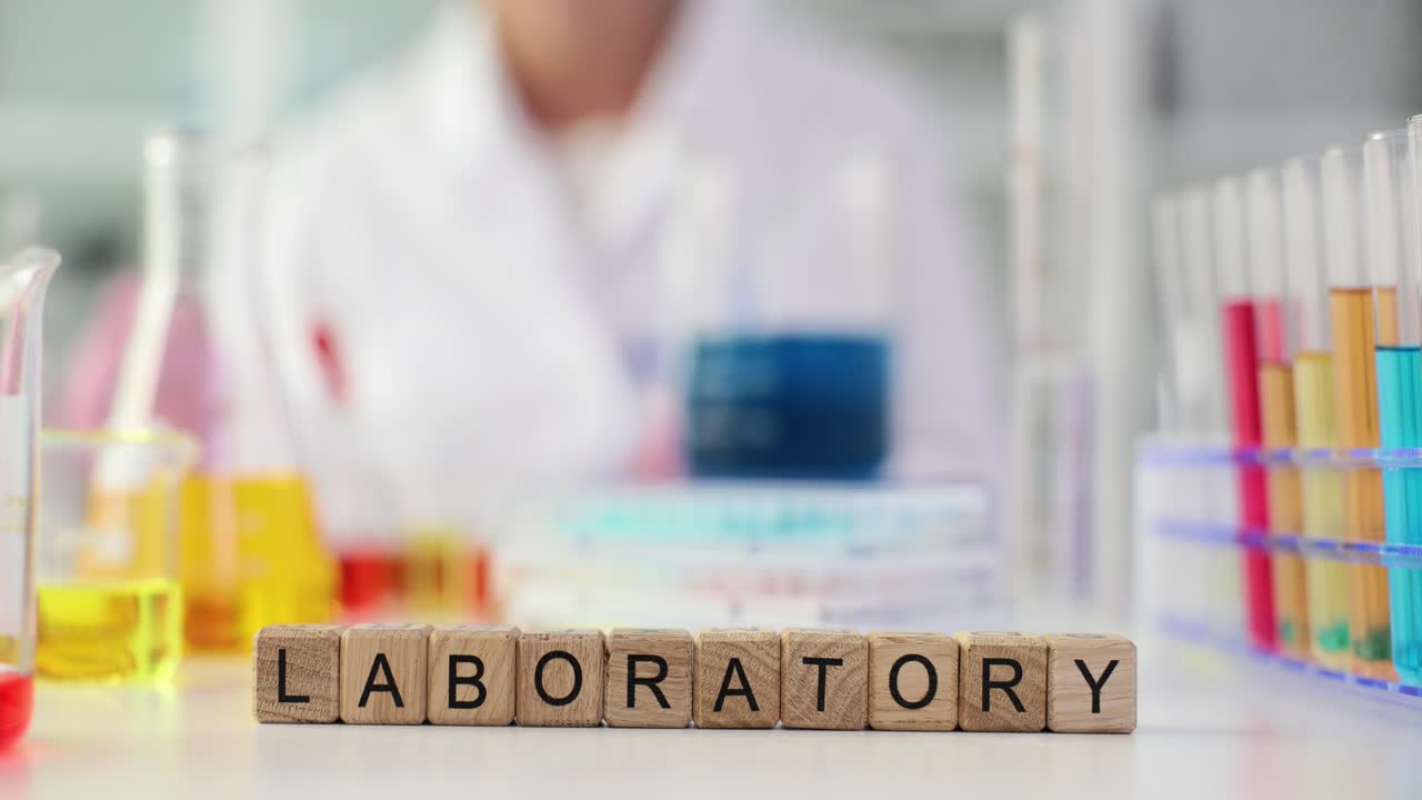 Laboratory experiment with test tubes and wooden blocks