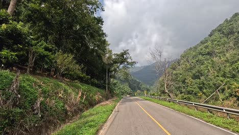 traveling through a lush mountainous landscape