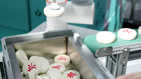 robotic arm handling chinese chess pieces with human interaction