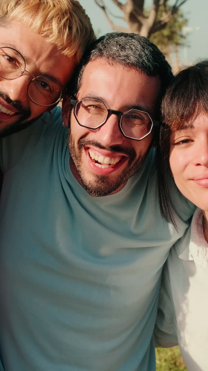 Happy Diverse Friends Hugging Outdoors