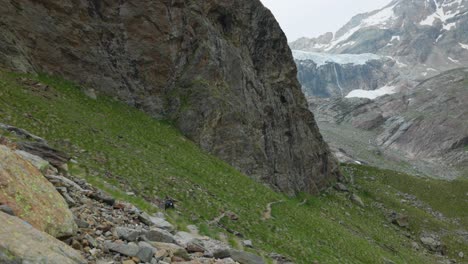 Tourist-Walking-On-Route-To-Fellaria-Glacier-In-Valmalenco,-Italy