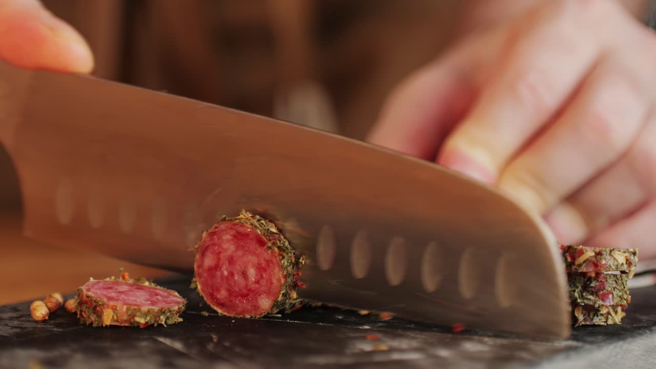 Mix of spanish pork sausages, Cutting board of appetizing catalonian snack - fuet, jamon, chorizo, olives, supermarket tapas food in spain, traditional cuisine.