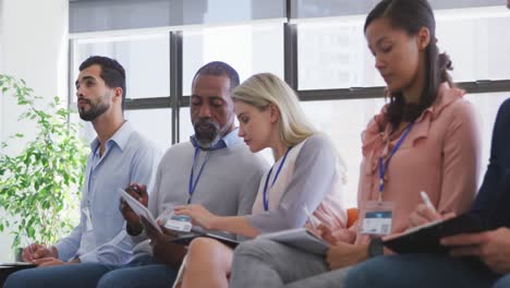 business people attending to a meeting in conference room