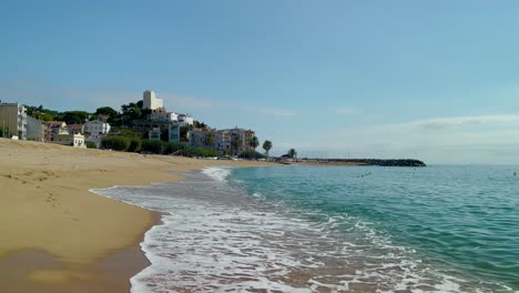 platja de les barques sea field maresme barcelona mediterranean coast plane close to turquoise blue transparent water beach without people