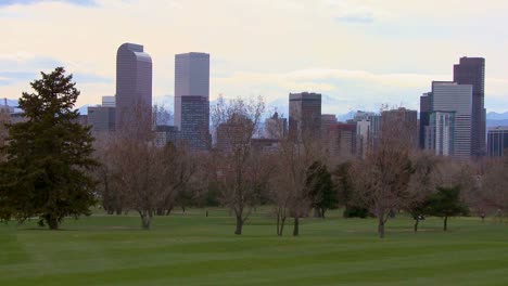 the denver skyline against the rocky mountains