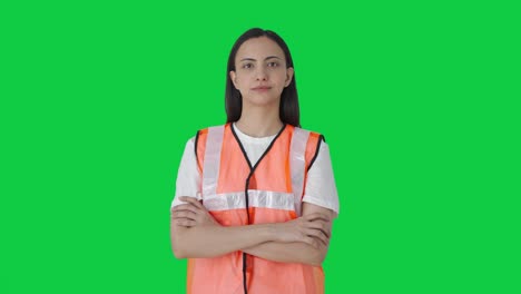 Portrait-of-Indian-airport-ground-staff-standing-crossed-hands-Green-screen