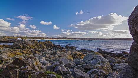 Guernsey-island-on-a-sunny-day,-view-from-the-rocky-coast-to-the-sea