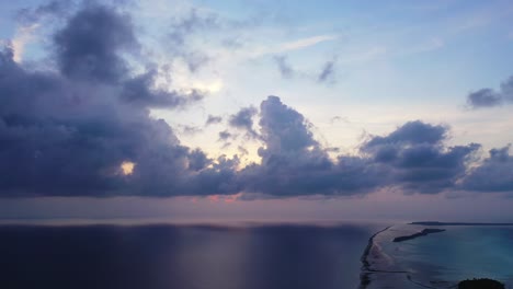 beautiful dramatic cloudscape and calm tropical ocean, hawaii