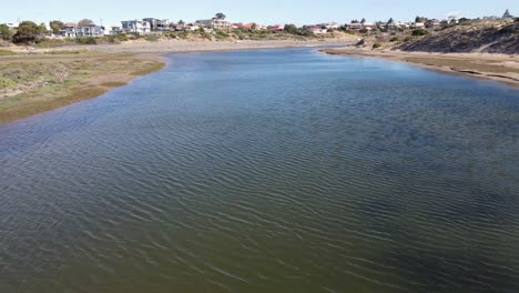 Smooth-flight-along-the-Onkaparinga-River,-Port-Noarlunga-South-Australia