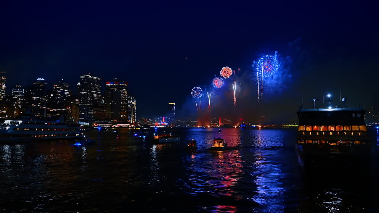 Beautiful fireworks at night over the East River. New York celebrates the 4th of July. View from the boat