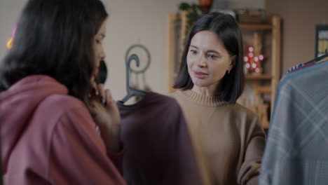 Mother and daughter shopping for clothes