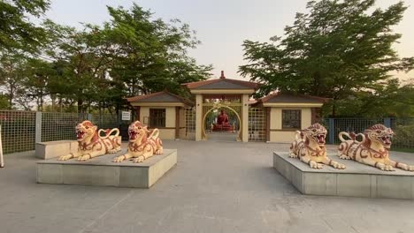 replica of traditional japanese garden with lion statue at the gate in eco park kolkata