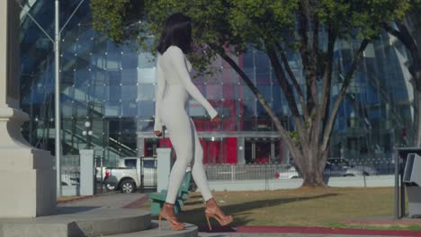 NAPA-in-the-background-as-a-young-girl-in-a-white-bodysuit-enjoys-her-day