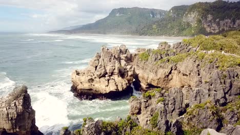 drone view of the pancake rocks at dolomite point, punakaiki, new zealand