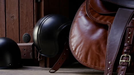 motorcycle helmets and leather saddle