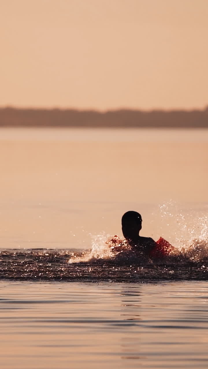 Boy having fun in water. Portrait little boy playing in water Vertical video