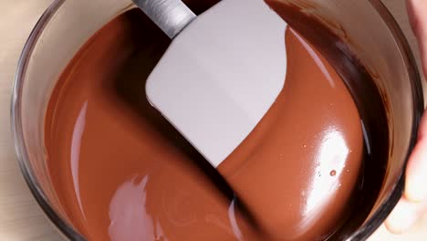 melted chocolate in glass bowl