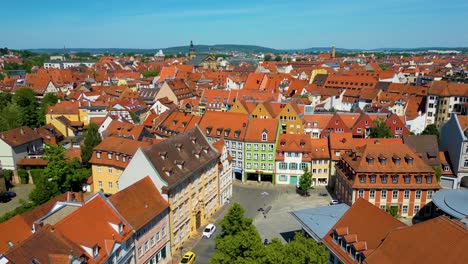 4k aerial drone video of the beautiful homes and churches in the old town area of downtown bamberg, germany