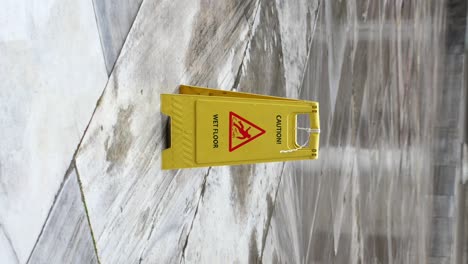 wet floor sign on tile flooring