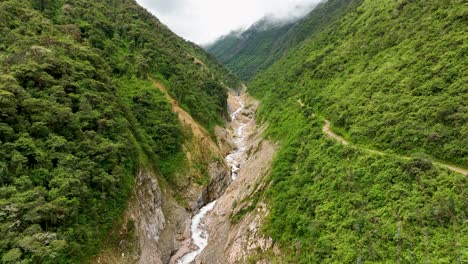 aerial drone view of urubamba river crossing the jungle, close to machu picchu pueblo, sacred valley, cusco region, andes, peru, south america