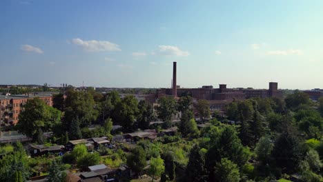 leipzig cotton spinning mill factory industrial architecture, characterized by brick buildings and a chimney