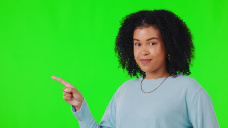 Woman,-pointing-finger-and-green-screen