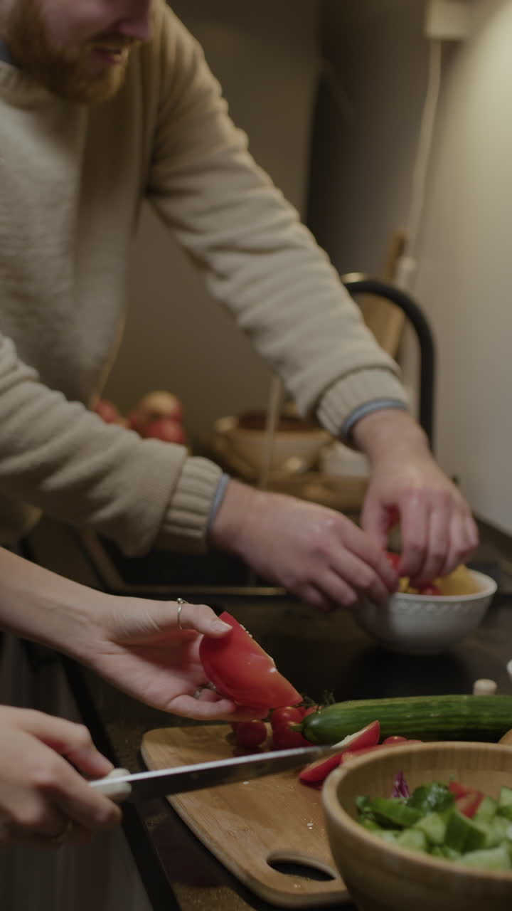 Preparing a fresh salad in the kitchen