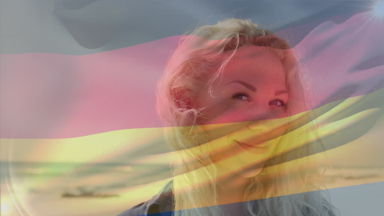 독일 국기가 바다에서 파도에 대한 공중 사진을 휘두르는 애니메이션