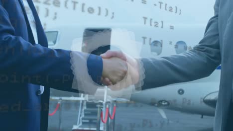 abstract shape and data processing on mid section of two businessmen shaking hands at airport runway