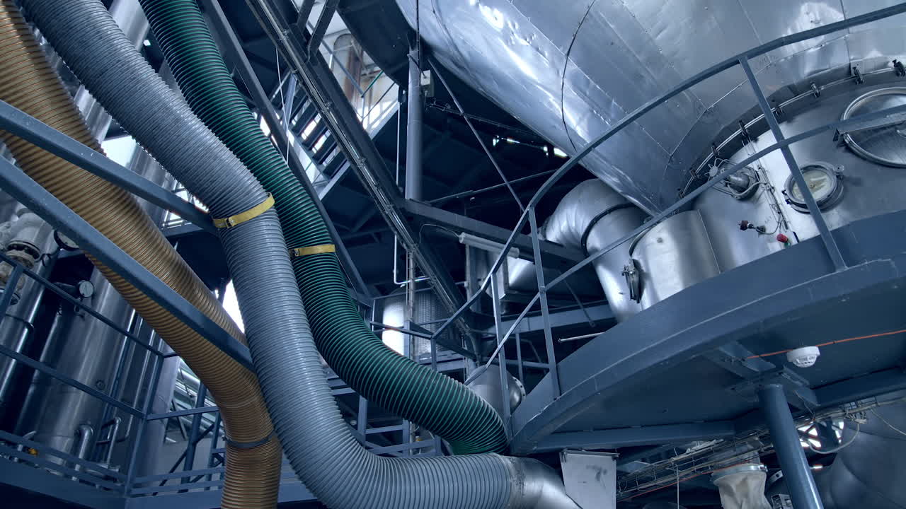 Milk making in modern technologies. Modern steel construction for making cheese.