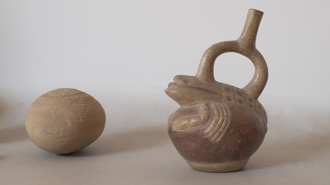 Traditional Andean Peruvian pottery, ceramic lobster vase. White background