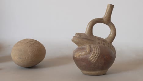 traditional andean peruvian pottery, ceramic lobster vase. white background