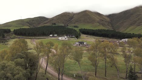 weekend houses viewed by drones in the beautiful green, short-grass mountains of tafí del valle, tucumán, argentina