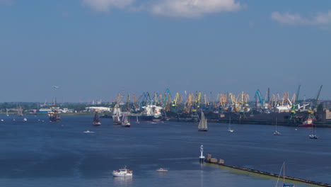 time lapse sailboat regata, industrial port background