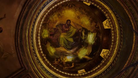 Tracking-close-up-shot-of-a-gorgeous-interior-ceiling-in-an-eclectic-cathedral-showing-the-dome