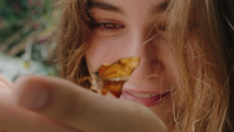 happy teenage girl holding butterfly learning insect natural habitat enjoying nature in wildlife sanctuary zoo 4k