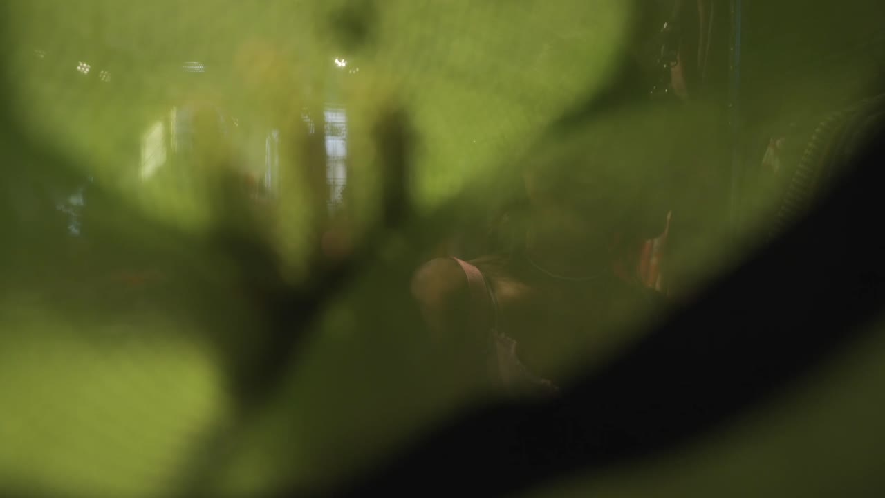 Women shopping for clothes and hats in a retail store