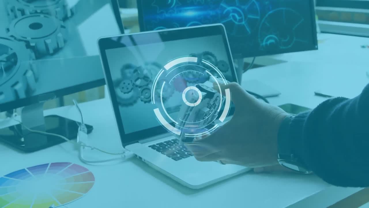 animación del icono de escaneo sobre la mano de un ingeniero caucásico sosteniendo un modelo de coche por computadora portátil y computadoras