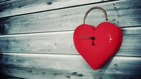 key opening a heart lock with valentines message