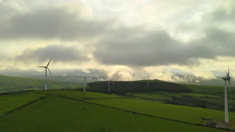 Rolling-Hills-With-Wind-Turbines-During-Sunrise-In-County-Wicklow,-Ireland