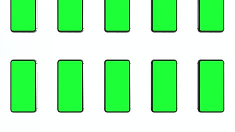 múltiples teléfonos inteligentes con pantallas verdes