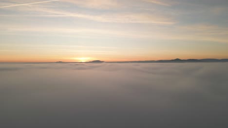 Amazing-view-over-clouds-at-sunset