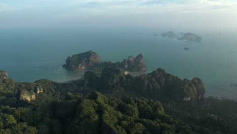 Drone flight over Krabi - Ao nang Thailand lime stone cliffs of Railay beach and Phranang beach