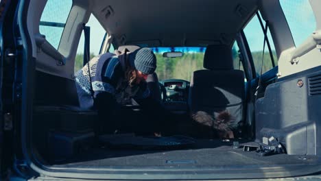 a man prepares the interior of a pajero by removing components for vehicle modification - close up