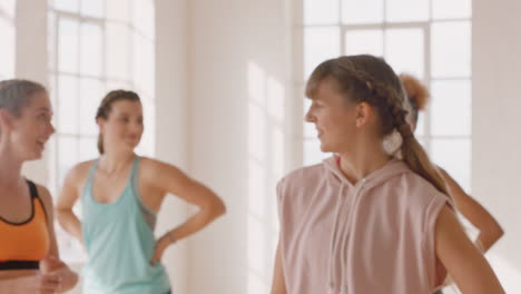 dance class young woman laughing enjoying healthy active lifestyle enjoying training in fitness studio with multiracial group of friends