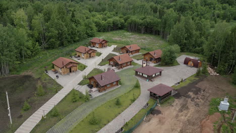 wooden cottages in a forest